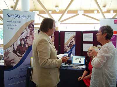 Storyworks stand with Lisa Heledd and Gilly Adams chatting with Joe Lambert of CDS